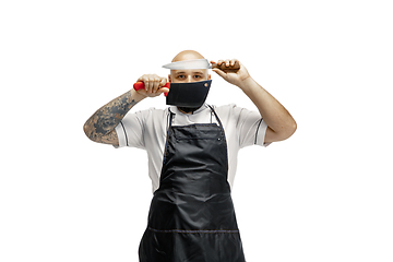 Image showing Portrait of a male chef cook, butcher isolated on a white studio background