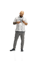 Image showing Portrait of a male chef cook, butcher isolated on a white studio background