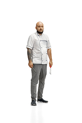 Image showing Portrait of a male chef cook, butcher isolated on a white studio background