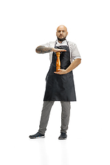 Image showing Portrait of a male chef cook, butcher isolated on a white studio background