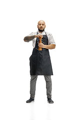 Image showing Portrait of a male chef cook, butcher isolated on a white studio background