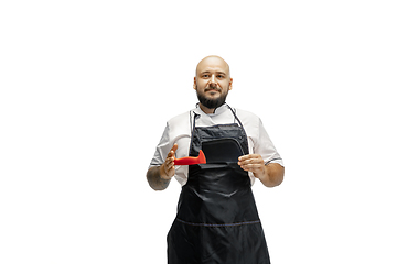 Image showing Portrait of a male chef cook, butcher isolated on a white studio background