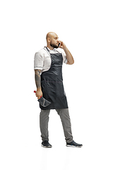 Image showing Portrait of a male chef cook, butcher isolated on a white studio background