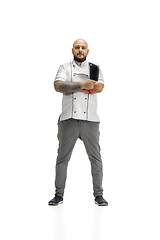 Image showing Portrait of a male chef cook, butcher isolated on a white studio background