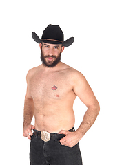 Image showing Shirtless man with a cowboy hat, looking at the camera