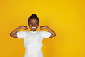 Image showing Smiling girl with surreal huge smile and big mouth looks shocked, attracted, wondered and astonished. Copyspace for ad.