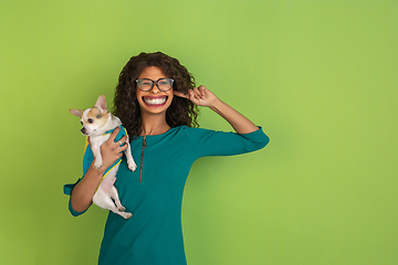 Image showing Smiling girl with surreal huge smile and big mouth looks shocked, attracted, wondered and astonished. Copyspace for ad.