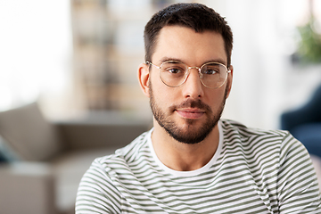 Image showing portrait of man in glasses at home