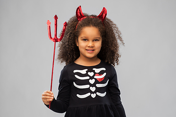 Image showing girl with trident and devil's horns on halloween