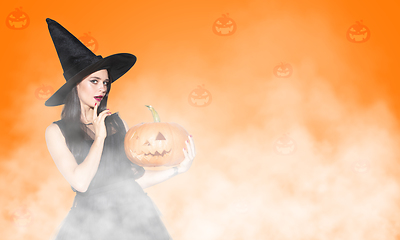 Image showing Young woman a witch on scary background