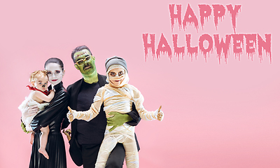 Image showing Young family as zombies on pink background, halloween time, flyer with copyspace