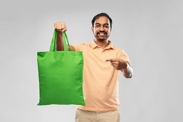 Image showing man with reusable canvas bag for food shopping