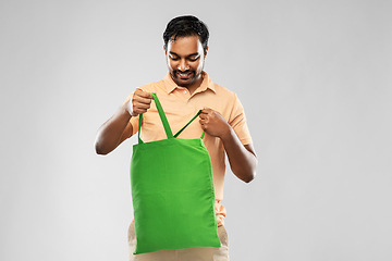 Image showing man with reusable canvas bag for food shopping