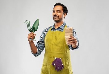 Image showing indian gardener or farmer with box of garden tools