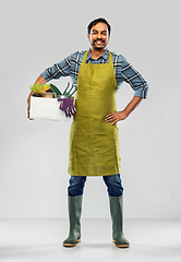 Image showing indian gardener or farmer with box of garden tools