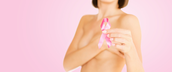 Image showing woman with pink breast cancer awareness ribbon