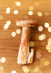 Image showing lactarius rufus mushrooms on wooden background