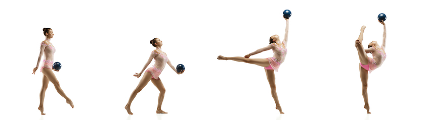 Image showing Little flexible girl isolated on white studio background. Little female rhythmic gymnastics artist in bright leotard