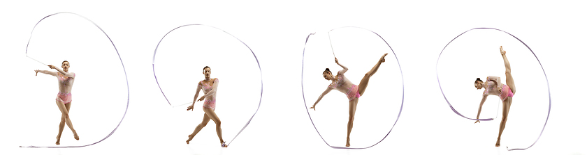 Image showing Little flexible girl isolated on white studio background. Little female rhythmic gymnastics artist in bright leotard