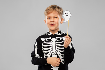 Image showing boy in halloween costume with ghost decoration