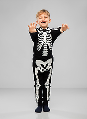 Image showing boy in halloween costume of skeleton making faces