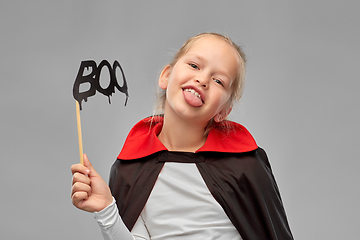 Image showing girl in costume of dracula with cape on halloween