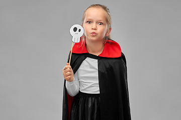 Image showing girl in costume of dracula with cape on halloween