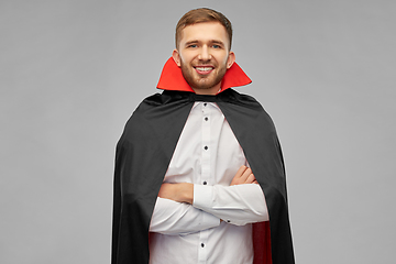 Image showing happy man in halloween costume of vampire