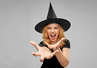 Image showing scary woman in black halloween costume of witch