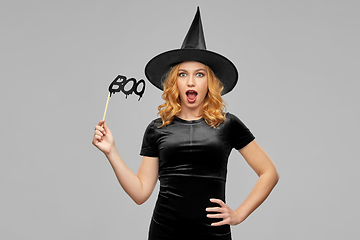 Image showing woman in halloween costume of witch with accessory