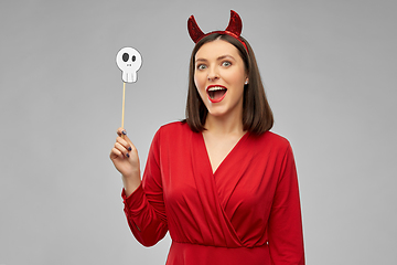 Image showing happy woman in red halloween costume of devil