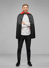 Image showing happy man in halloween costume of vampire