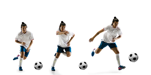 Image showing Confident football player in motion and action isolated on white background, kicking ball in dynamic