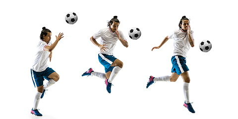 Image showing Confident football player in motion and action isolated on white background, kicking ball in dynamic