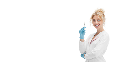 Image showing Portrait of female doctor, nurse or cosmetologist in white uniform and blue gloves over white background