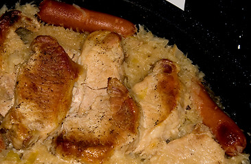 Image showing Sauerkraut And Meats In A Baking Pan