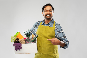 Image showing indian gardener or farmer with box of garden tools