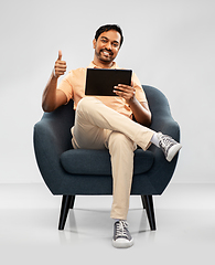 Image showing happy indian man with tablet pc showing thumbs up