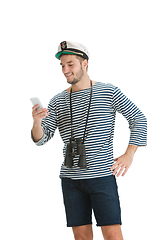 Image showing Caucasian male sailor in uniform isolated on white studio background