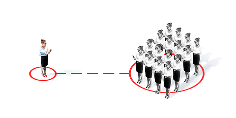 Image showing Studio shot of people demonstrating social distancing with arrows indicating the separation.