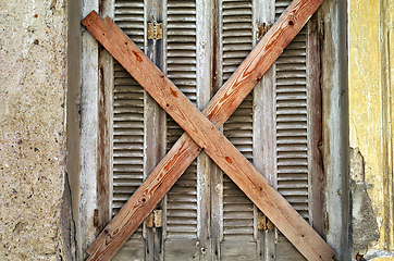 Image showing boarded up window shutter