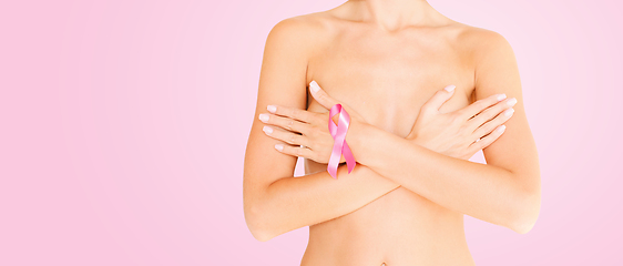 Image showing woman with pink breast cancer awareness ribbon