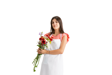 Image showing Young woman, florist with bouquet isolated on white studio background