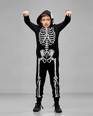 Image showing boy in halloween costume of skeleton making faces