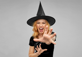 Image showing scary woman in black halloween costume of witch