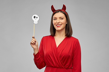 Image showing happy woman in red halloween costume of devil