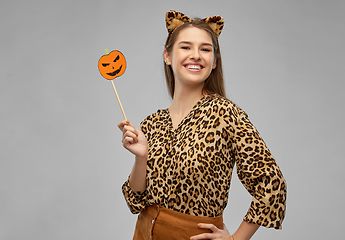 Image showing happy woman in halloween costume of leopard