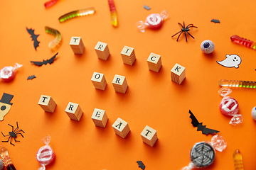 Image showing trick or treat letters and halloween sweets