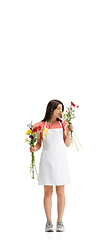 Image showing Young woman, florist with bouquet isolated on white studio background