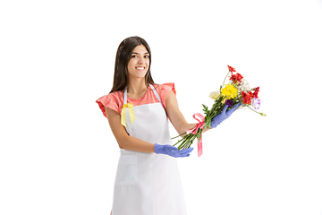 Image showing Young woman, florist with bouquet isolated on white studio background